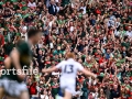 Mayo supporters celebrate after Darragh Beirne of Mayo, 13, scored their side's goal during the All-Ireland SFC final